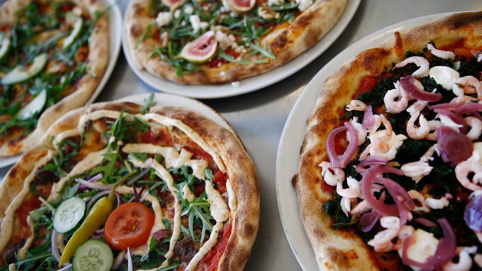 Trots en skylt med texten "Fråga gärna personalen om allergener" har pizzerians personal haft dålig koll på innehållet i maten.