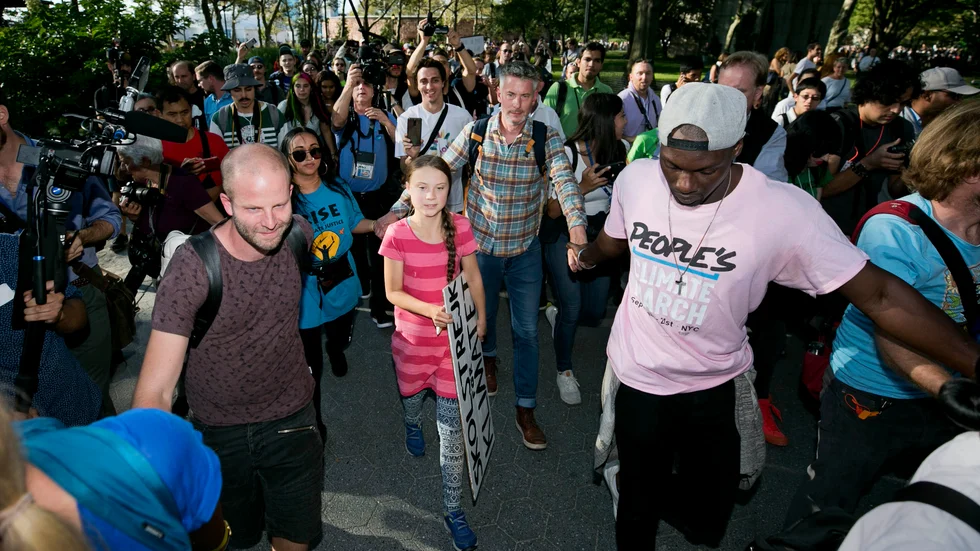 Greta Thunberg gick i spetsen för tusentals klimatdemonstranter i New York i fredags.