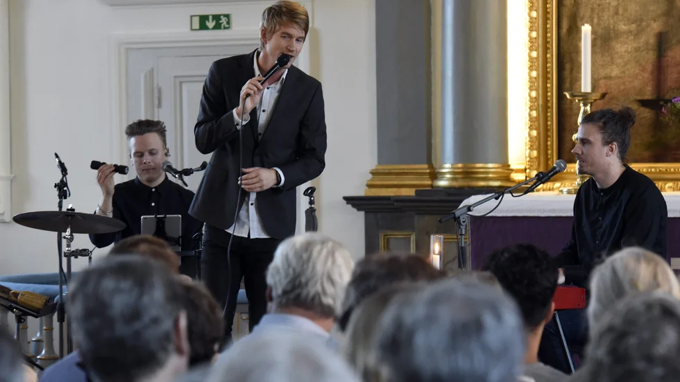 Erik Linder med Trion under en av Rotarys välgörenhetskonserter i kyrkan innan pandemin.