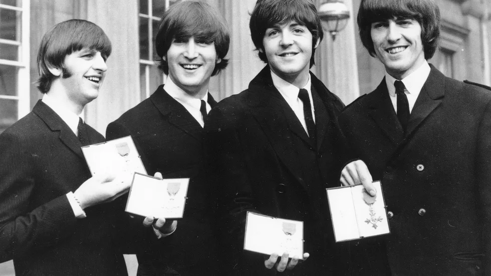 The Beatles – Ringo Starr, John Lennon, Paul McCartney och George Harrison – fotograferade i London 1965. Arkivbild.