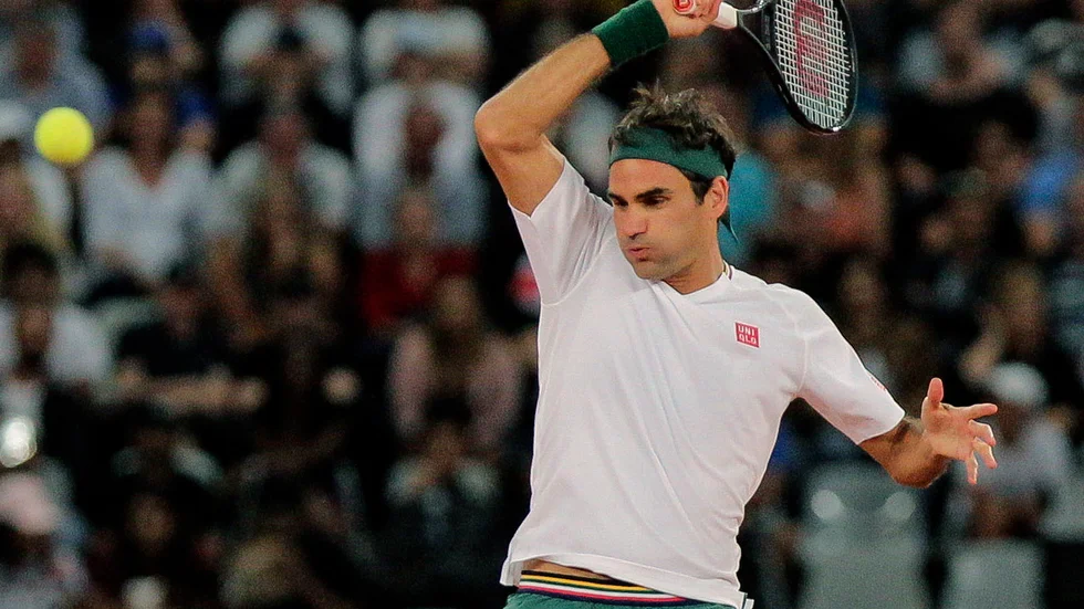 Blir det något Wimbledon-spel för Roger Federer och de andra tennisstjärnorna i år? Arkivbild.