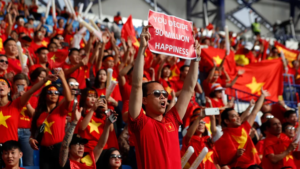 Vietnamesiska supportrar är välkomna tillbaka till fotbollsarenorna. Bilden är tagen från när nationens landslag mötte Japan i asiatiska mästerskapen förra året. Arkivbild.