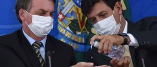 Bolsonaro sparkar minister efter coronatvist
