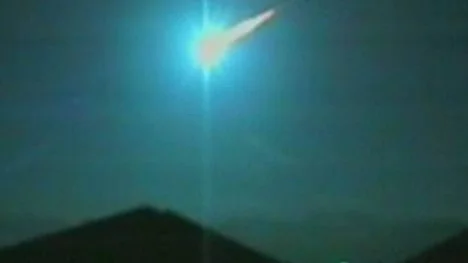 A meteor streaks across the western Australian sky Saturday, Dec. 3, 2005 in this image taken from television. Residents in Perth, Australia, witnessed a spectacular light show on Saturday night as a meteor blazed through the sky, leaving a bright tail in its wake. The moment was captured on camera by Karun Cowper, who was enjoying a meal with his family at Halls Head, south of Perth. (AP Photo/ AP Television News) ** AUSTRALIA OUT INTERNET OUT ONLINE OUT **