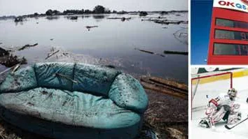 A sofa remains on the rice paddy flooded by tsunami following last Friday's earthquake in Sendai, Miyagi Prefecture, Japan, Sunday, March 13, 2011. (AP Photo/Shuji Kajiyama)