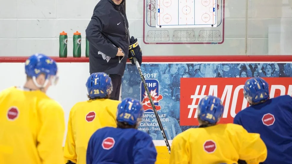Team Sweden's head coach Tomas Monten goes over a play during practice at the world junior ice hockey championships Tuesday, Jan. 3, 2017, in Brossard, Quebec. Sweden plays Canada in the semifinals on Wednesday. (Ryan Remiorz/The Canadian Press via AP)
