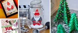 Tomte i burk och grafiska granar