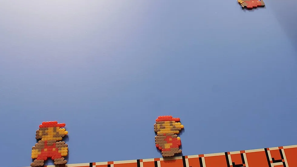 Super Mario-tavlan ska hängas upp i bibliotekslokalerna.