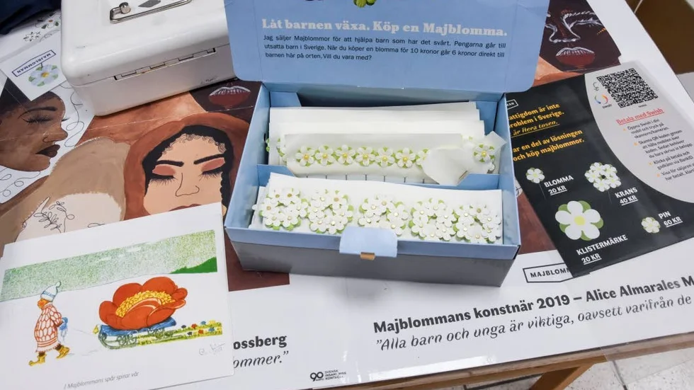 Majblommor till försäljning.