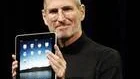 Apple CEO Steve Jobs shows off the new iPad during an event in San Francisco, Wednesday, Jan. 27, 2010. (AP Photo/Paul Sakuma)
