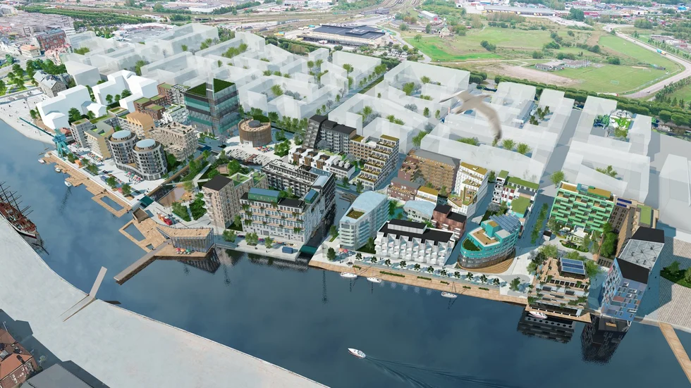 De ljusa terasserade husen i mitten är bland de första som kommer att stå färdiga i Inre Hamnen, våren 2024.
