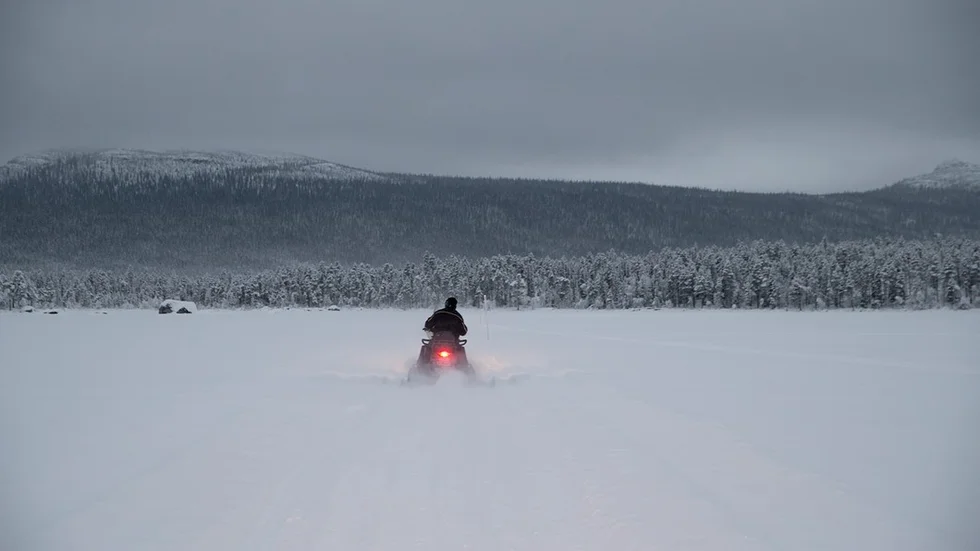 snöskoter i fjällen