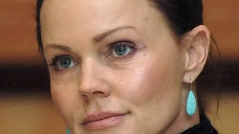 American singer Belinda Carlisle listens to journalists´ questions during  Slovakian Opera Ball press conference held in Bratislava on Friday, Jan. 11, 2008. (AP Photo/CTK, Andrej Stolar) **SLOVAKIA OUT**