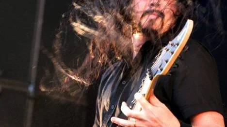 Tom Englund och hans Evergrey avslutar fredagskvällens program.