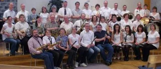 50-årsjubilerande orkester med blåskraft och som spelar i dur och skur