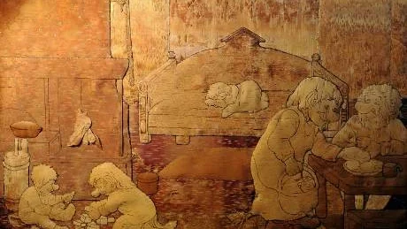 GRUNDEN. "Det roligaste av arbetet med tavlorna är detta. Att göra motivet", säger Lisa. Här en skön bild där trollfamiljen njuter kvällsro i skenet från den öppna spisen.