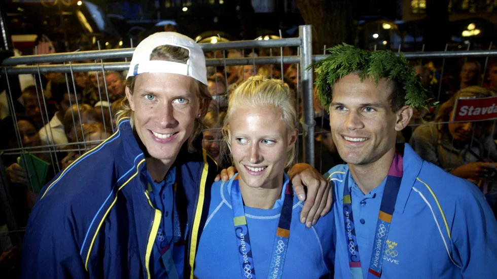 Guldmedaljörerna Christian Olsson, Carolina Klüft och Stefan Holm i samband med en hyllning strax efter OS 2004.