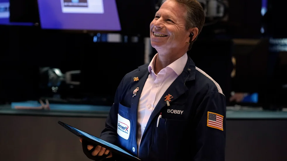 Glada miner på Wall Street. Arkivbild.