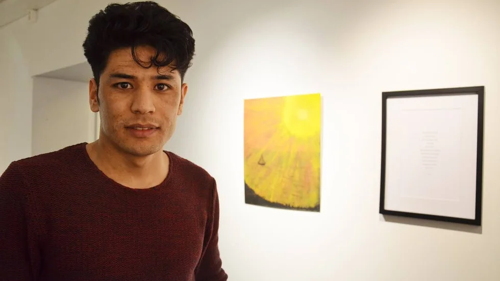 Ljus och mörker. Safi Ahmadis tavla handlar om hans svårigheter i livet.