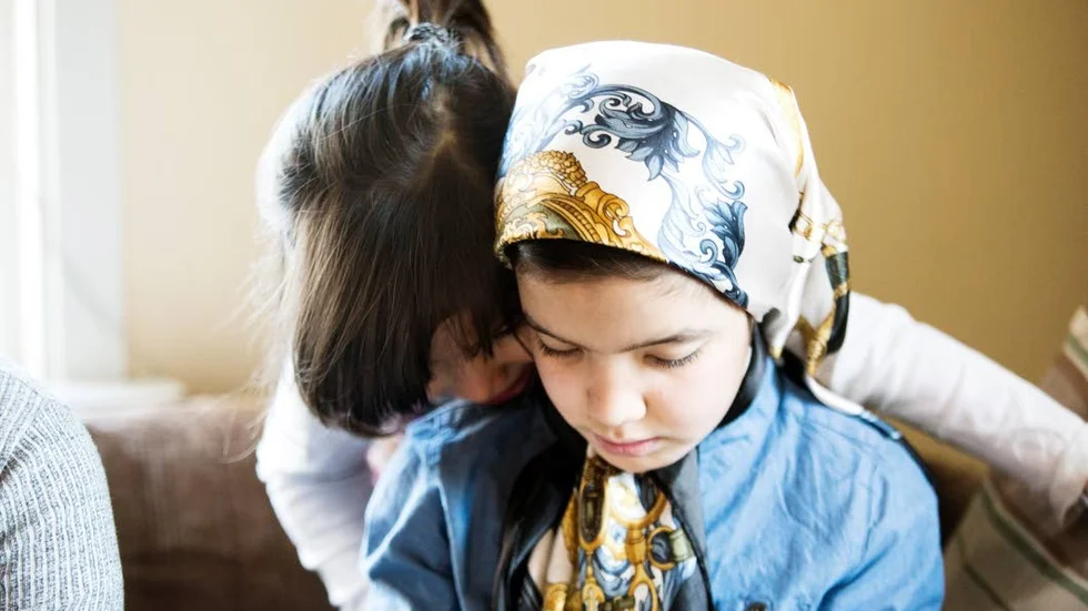 Varken Mohaddese, 13, och lillasyster Fatemeh, 6, har någonsin varit i Afghanistan.