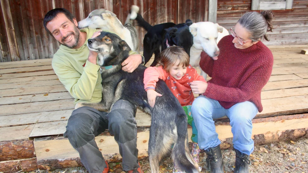 The Lutz family together with some of their dogs.