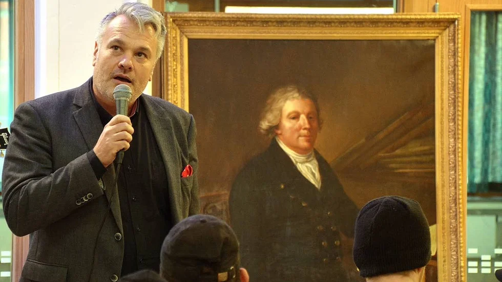 Gymnasiechef. Anders Palmgren beskrev tillkomsten av skolan där Christian Eberstein (tavlan) innan sin död 1816 ville donera pengar till en skola i Norrköping. Så skedde också.