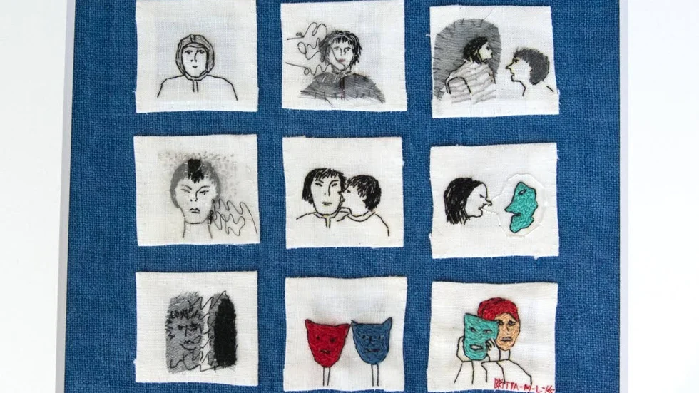 bakom masken. Textil med broderi, gjort  efter en förlaga i akvarell.