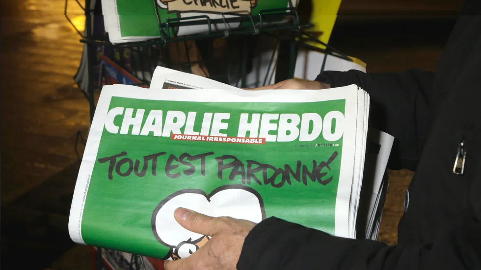 Satirtidningen Charlie Hebdo är känd för sina provokativa teckningar och sekulära, antireligiösa hållning. Arkivbild.