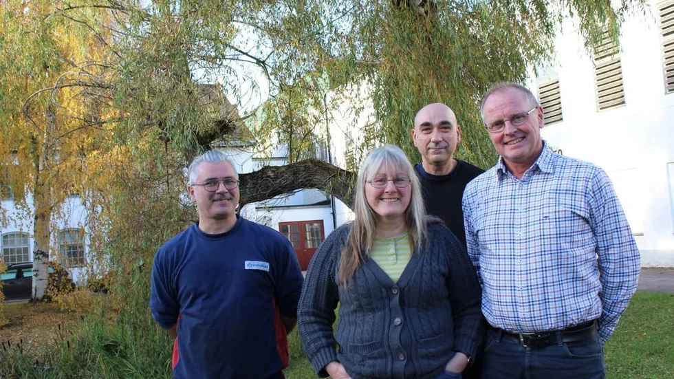 Glada fackliga. Från vänster Ted Andersson, IF Metall; Anna Uldén, Unionen; Smail Alisic, IF Metall, och Leif Söderlund, Unionen.