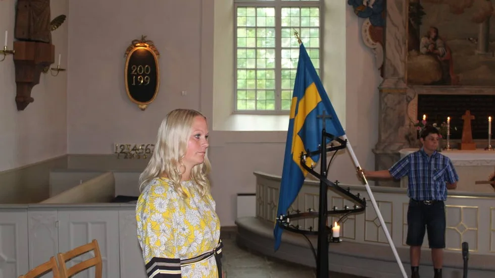 Rektor Caroline Anspach och fanbärare Arn Jonsson