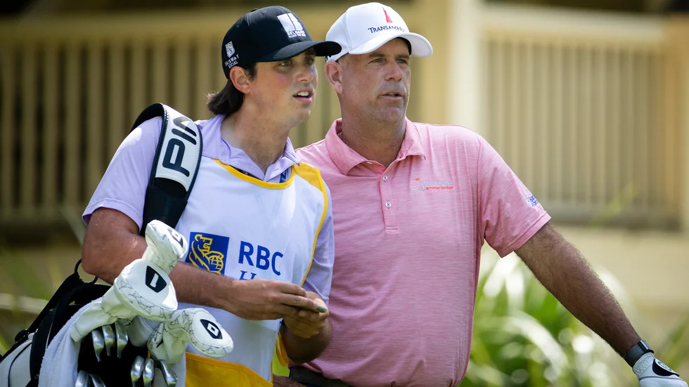 Stewart Cink med sonen Regan som caddie.