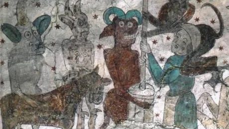 På årsbokens omslag syns en tjuvmjölkerska i Öja kyrka - sen rids hon av djävulen in i helvetet.
