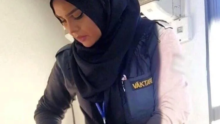 Securitas neutralitetspolicy gör att Hoda inte får ha slöja på arbetet.