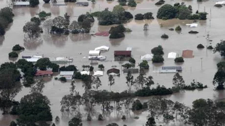 An entire suburb is submerged outside Ipswich, west of Brisbane, Australia, Wednesday, Jan. 12, 2011. Emergency sirens blared across Australia's third-largest city Wednesday as floodwaters that have torn a deadly path across the northeast poured into an empty downtown, swamping neighborhoods in what may be Brisbane's worst flooding in 100 years. (AP Photo)