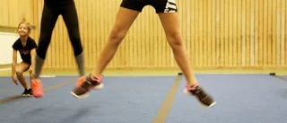 Cheerleading med gymnastik och byggen