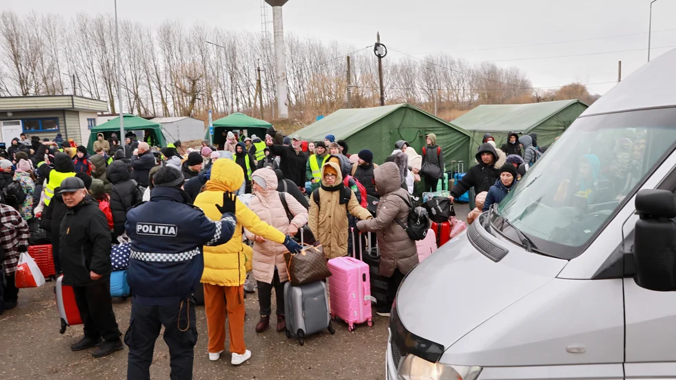 Moldavien tar emot ukrainska flyktingar vid gränspassagen Palanca-Maiaki-Udobnoe. Bild tagen av FN:s fotograf den 1 mars.