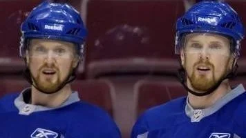 Henrik Sedin, till vänster, och Daniel Sedin, till höger.