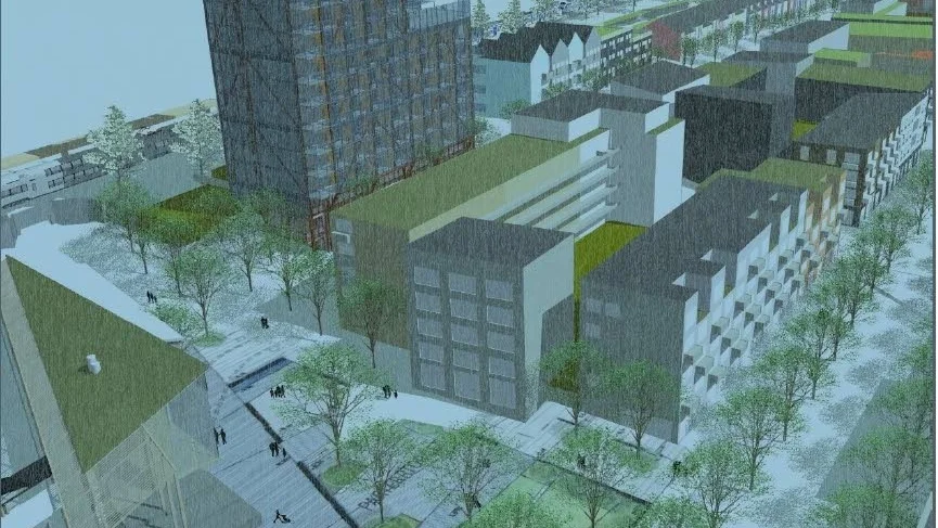 Bålsta torg skymtar längst till vänster. Där planeras Bålsta nya resecentrum. Området tillhöger i bild är nästa etapp med bostäder och 17-våningshuset i trä.