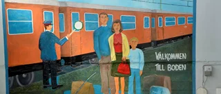 Han målar om järnvägstunnel