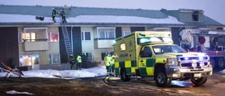 Misstänkt mordbrännare vägrade gå ner från taket
