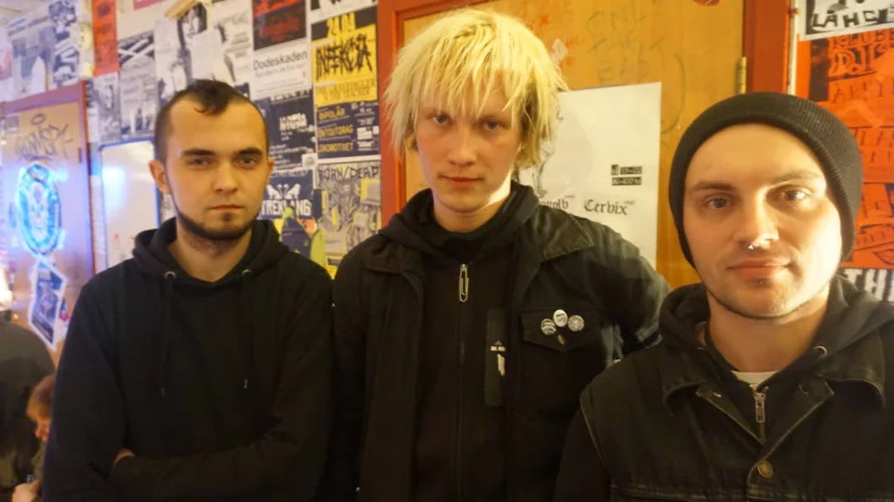 Hemma i Belarus anklagas punkarna Sasha,  Zhenya och Dima vara terrorister och extremister.