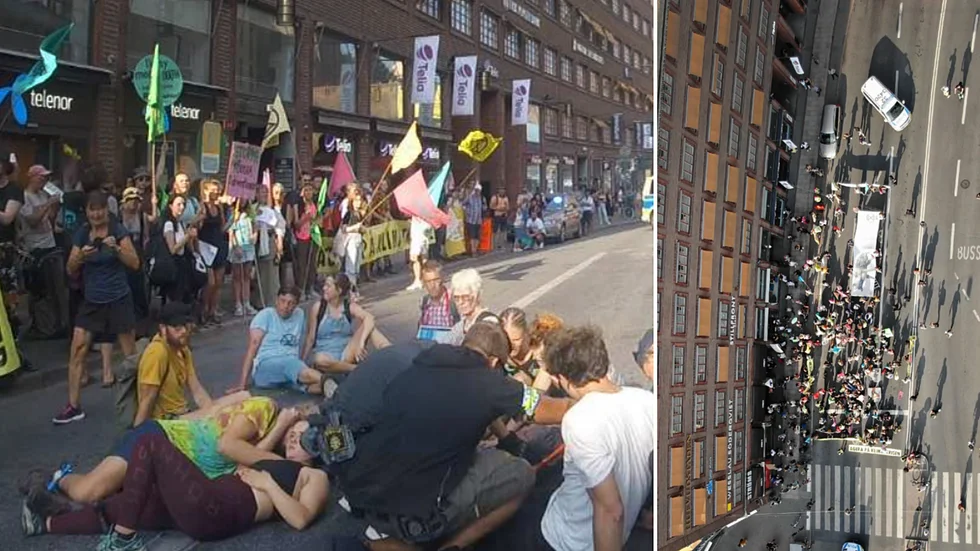 Klimataktivister startade en stillastående demonstration på Kungsgatan i Stockholm den 19 augusti 2022.