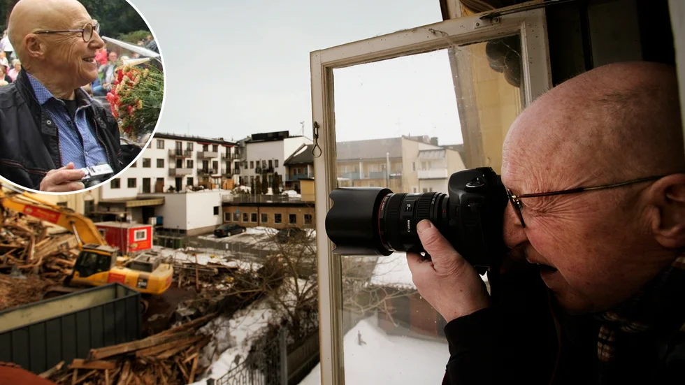 Stig Norling, fotograf. Här syns han dokumentera rivningen av Stadshotellet från ett fönster på Westerlundska gården.