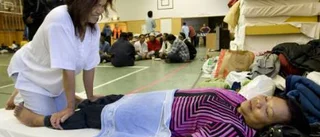Thailändarna får halva skulden betald