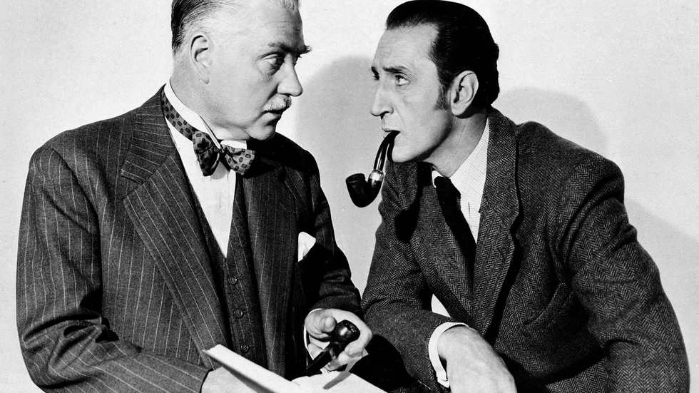 Basil Rathbone och Nigel Bruce i Sherlock Holmes-filmen "The house of fear" från 1945.