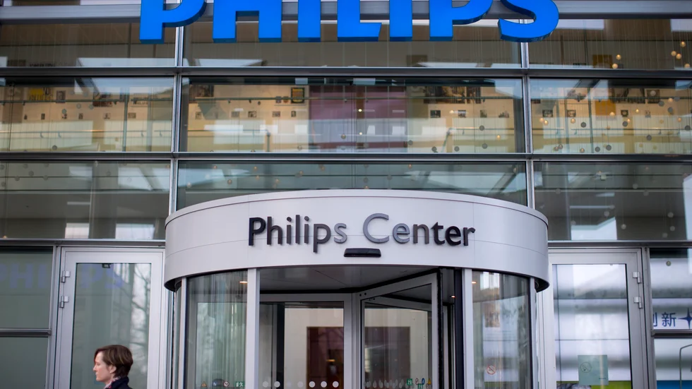 Nederländska Philips klår förväntningarna och höjer prognosen. Arkivbild