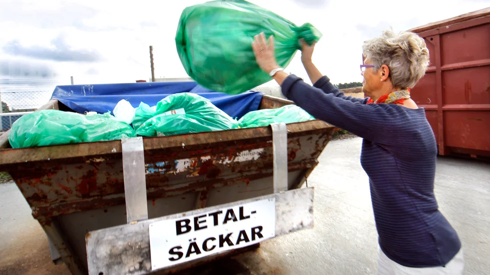 Gröna betalsäckar.