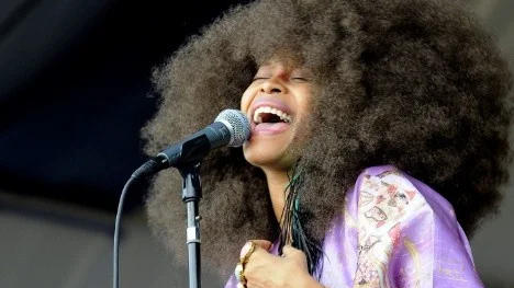 Erykah Badu performs at the New Orleans Jazz and Heritage Festival, Saturday, April 25, 2009 in New Orleans. The festival features hundreds of acts on 12 stages this weekend and next. The festival will continue Sunday and pick up again on Thursday. Among this year's headline acts are Bon Jovi, Neil Young, Kings of Leon and Sugarland. (AP Photo/Cheryl Gerber)