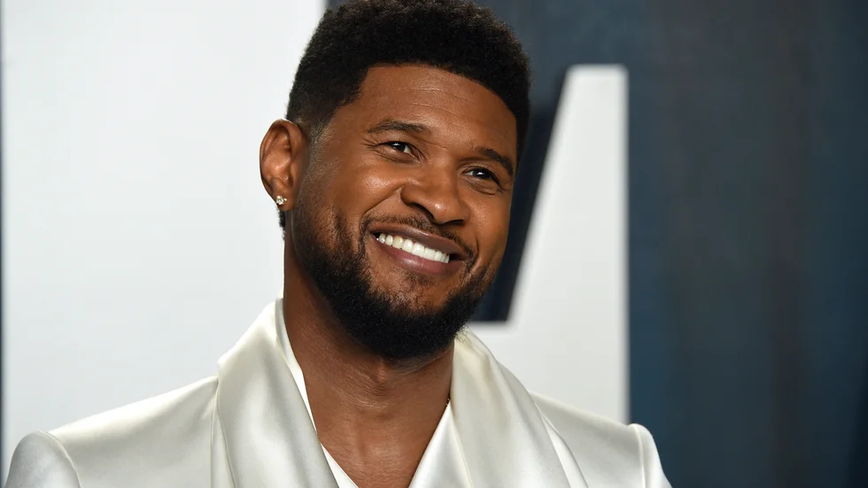 Usher spelar på Super Bowl. Arkivbild.