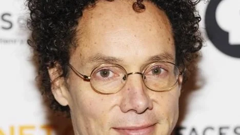 In this Feb. 1, 2010 file photo, writer Malcolm Gladwell attends the premiere screening of 'Faces of America With Dr. Henry Louis Gates Jr.'  at Jazz at Lincoln Center in New York. Gladwell was among the five Library Lions announced Wednesday, Aug. 4, 2010 by the New York Public Library. The winners, who were chosen based on "their contributions to the world of ideas," will be honored honored Nov. 1 at a black-tie gala. (AP Photo/Evan Agostini, File)